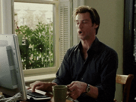 An NES-style GIF of myself coding and giving a thumbs up